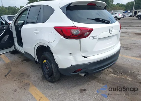2016 Mazda Cx-5 Grand Touring z USA, uszkodzony, nr VIN JM3KE4DY5G0661185